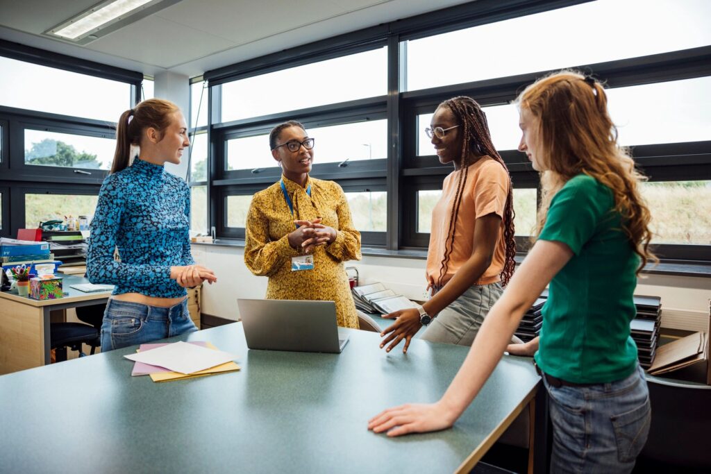 Teacher Discussing with Students